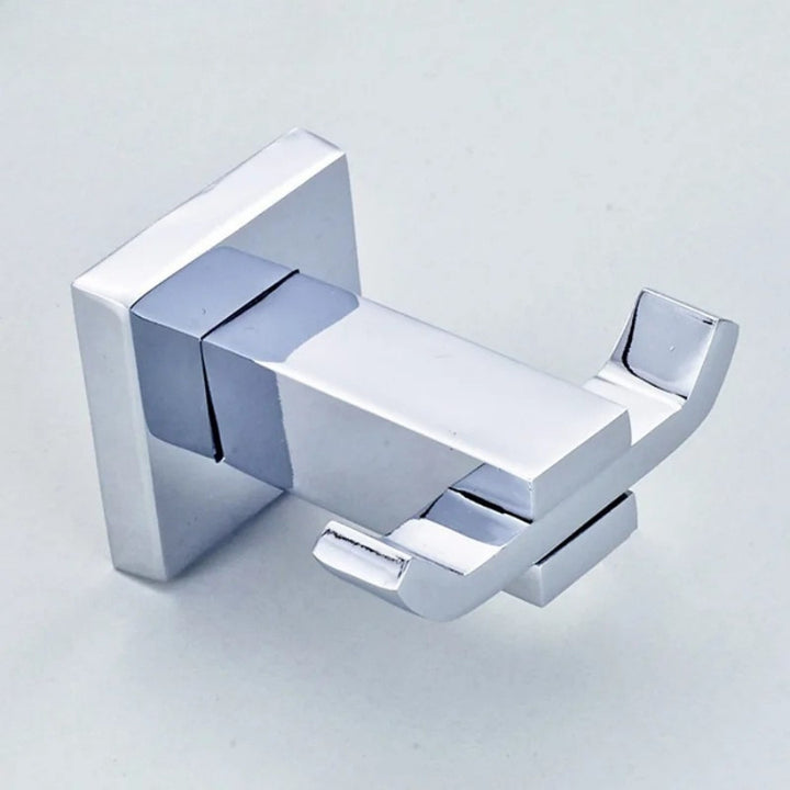 Patère murale inox design carré finition chromée poli miroir.